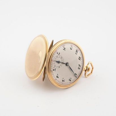 Gusset watch in yellow gold (750). Grooved...