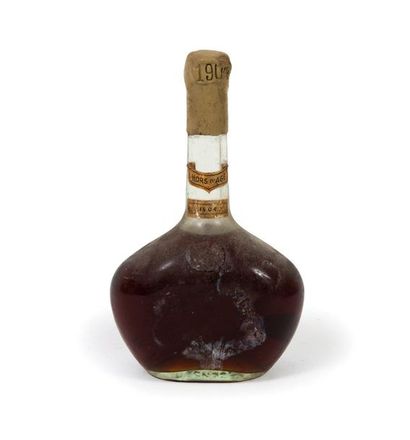 null GELAS & SONS One bottle, 1904.
Armagnac Hors d'âge.
Low level.
Absent label.
Wax...