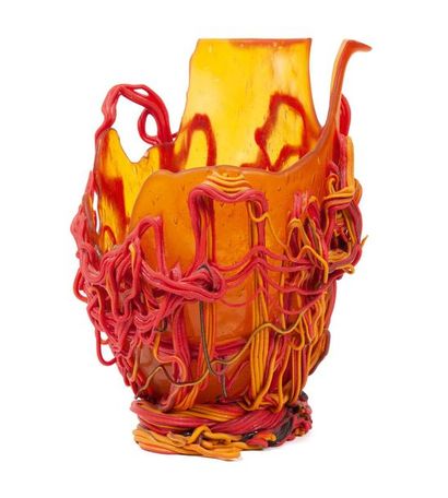GAETANO PESCE (1939) 
Spaghetti.
Free-form vase.
Made of yellow and red resin.
Fish...