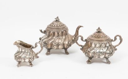 E. HUGO Silver (950) tea set (three pieces) including a quadripod teapot, sugar bowl...