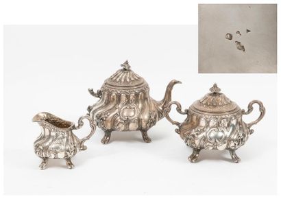 E. HUGO Silver (950) tea set (three pieces) including a quadripod teapot, sugar bowl...