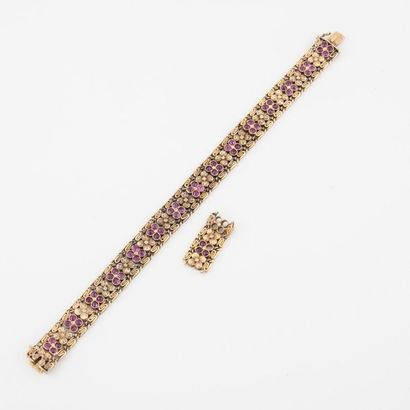 null Bracelet articulé en or jaune (750) à motif alterné de fleurette ciselée ou...