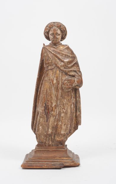 Début du XVIIIème siècle. Statuette de Saint (?) en bois sculpté.

Traces de polychromie

H....