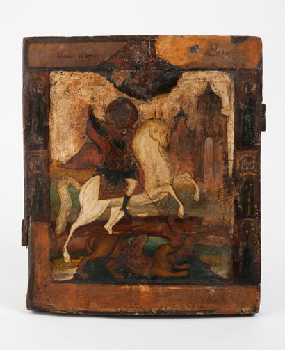 RUSSIE, XVIIème siècle Saint Georges terrassant le dragon.

Icône.

Tempéra sur bois.

26,5...