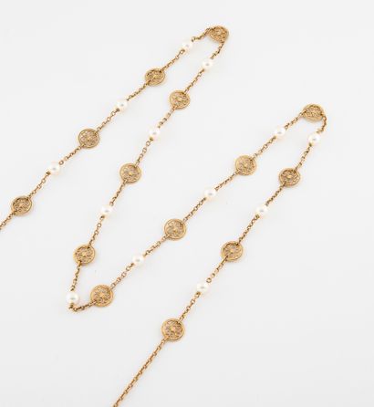 null Sautoir en or jaune (750) à maillons ronds filigranés alternés de perles de...