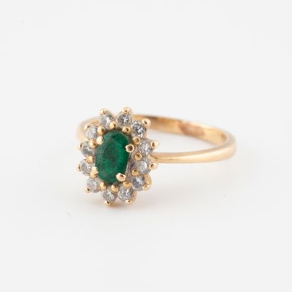 Yellow gold (750) daisy ring centered by...