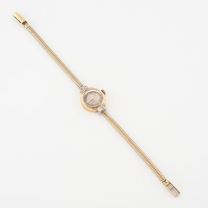 ZENITH Lady's watch in yellow gold (750) 

Round housing. 

Copper-bottomed dial,...