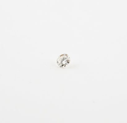 null Small brilliant-cut diamond on paper. 

Diamond weight: 0.12 carats. 

Grin...