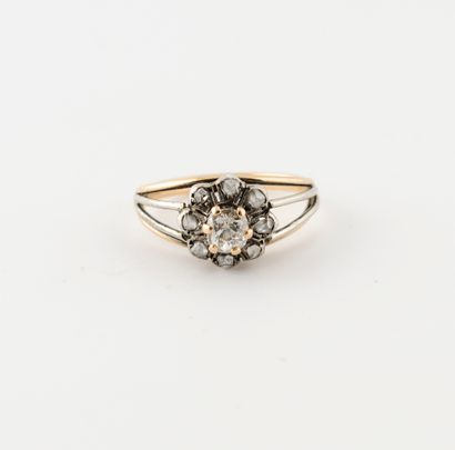 Flower ring in yellow gold (750) and silver...