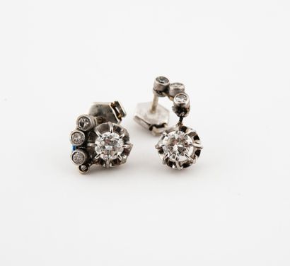 null 
Pair of earrings in platinum (850) and white gold (750) adorned with half-cut...