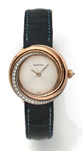 CARTIER, Trinity
Ladies' wristwatch.
Round case in three-tone gold (750), the bezel...
