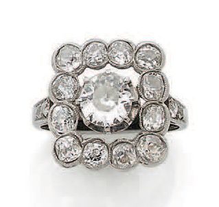 null Jolie bague en platine (850) de forme rectangulaire centrée d'un diamant taille...
