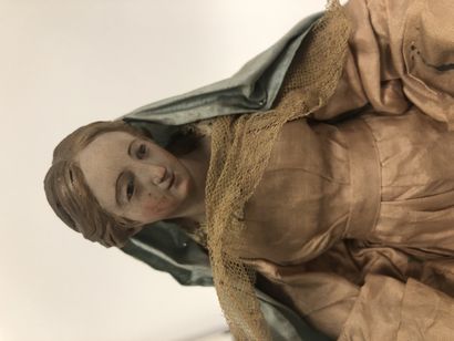 NAPLES, XIXème siècle Trois sujets de crèche.
La Vierge Marie agenouillée et Saint...