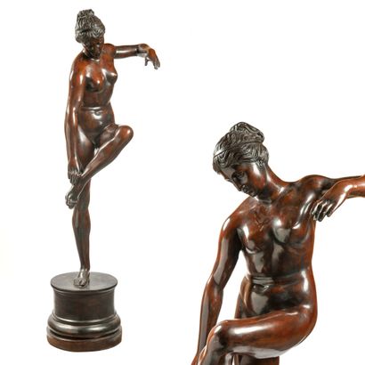 null Standing Aphrodite catching her left foot.

Proof in bronze with a shaded brown...