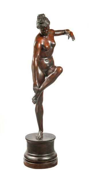 null Standing Aphrodite catching her left foot.

Proof in bronze with a shaded brown...