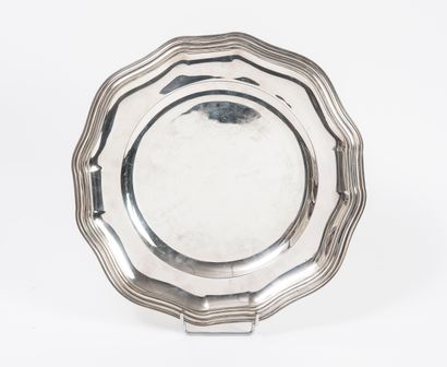 Tétard Frères Circular silver dish (950) with a curved edge, underlined by nets....