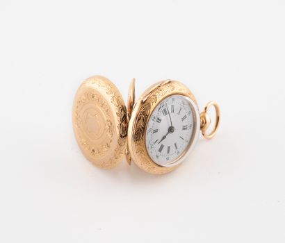 null Yellow gold (750) collar watch.

Back cover with central decoration of an unnumbered...