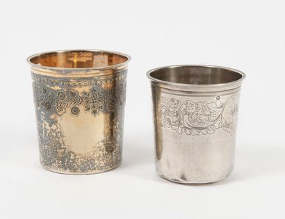 FRANCE, XIXEME SIECLE Two silver (950) goblets:

- one gilt, with the neck underlined...