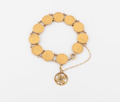 null Yellow gold (750) bracelet made of two gold pesos coins, 1919 and 1920, holding...