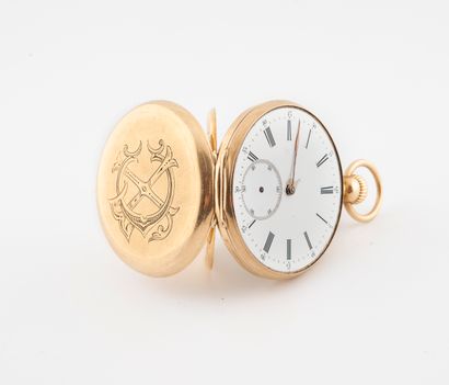 null Yellow gold (750) pocket watch.

Back cover engraved J.T.C.

White enamelled...