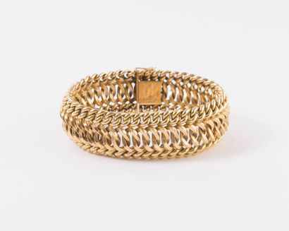 null Yellow gold (750) bracelet with American mesh. 

Ratchet clasp with eight safety...