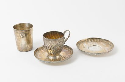 Alphonse DEBAIN Cup and two saucers, on moulded frame, in silver (950) with decoration...