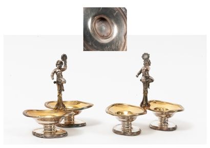 ODIOT, à Paris Pair of double silver (950) and gilt salerons formed by oval basins...