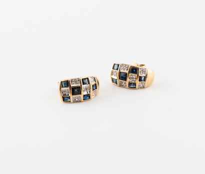  Pair of yellow gold (750) earrings set with calibrated sapphires and small brilliant-cut...