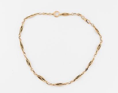  Yellow gold (750) watch chain with long links, transformed into a necklace. 
Clasp...