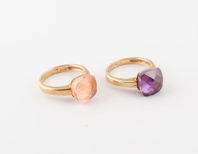 null Two silver rings (min. 800) set with a faceted pink or violet stone. 

Total...