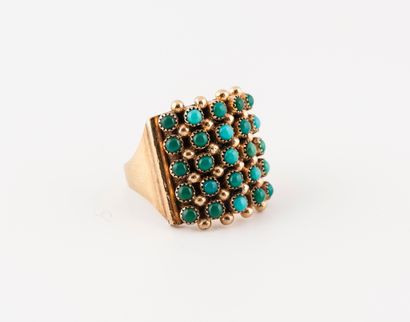  Yellow gold ring (585) with a curved top set with small gold beads and turquoise...