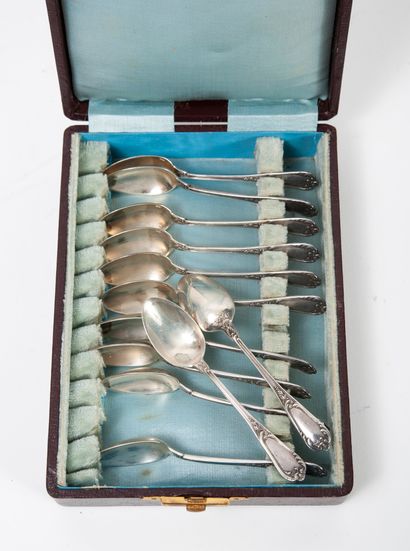 Henri SOUFFLOT Twelve silver mocha spoons (950) with foliage and scroll decoration....