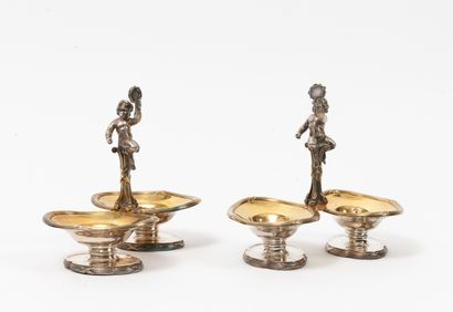 ODIOT, à Paris Pair of double silver (950) and gilt salerons formed by oval basins...