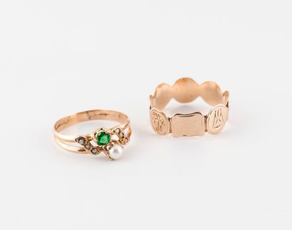 Two yellow gold (750) rings: 
- one formed...