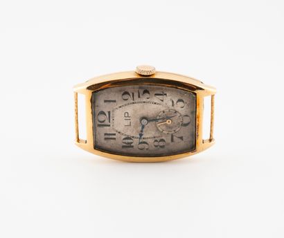 LIP Montre bracelet d'homme.

Boîtier tonneau en or jaune (750).

Cadran à fond gris...