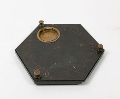 null 
Hexagonal sundial in black slate with three adjustable screws in gilded brass.




Engraved...