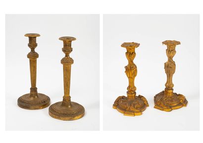 null 
Two pairs of bronze or gilt brass torches:




- One in the Louis XVI style,...