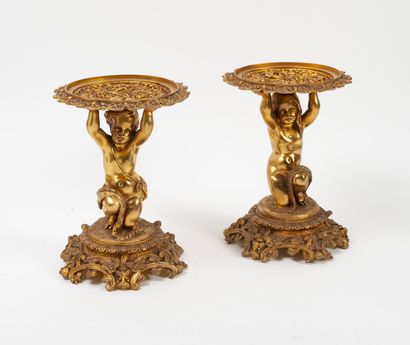 
A gilt bronze and metal set, including a...