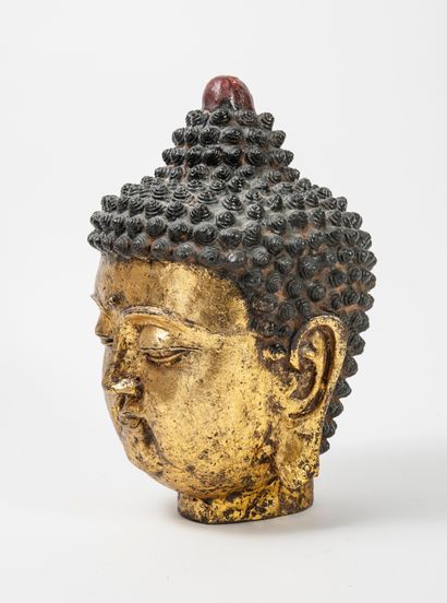 CHINE ou BIRMANIE, début du XXème siècle Tête de Bouddha

Epreuve en bronze à patine...