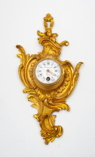 null 
Small ormolu alcove cartel.




Enamel dial by BALTHAZAR in Paris, with a square...
