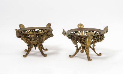 BARBEDIENNE Two circular gilt bronze cup mounts with four consoles with piastres...