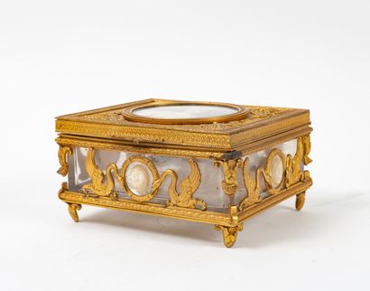 null 
Lot :




A pair of white marble and gilt bronze cassolettes, supported by...