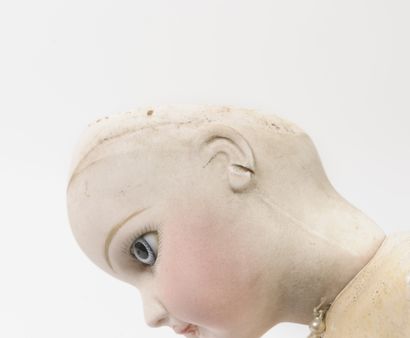 null 
Doll, porcelain head marked in hollow, fixed blue eyes with rays, closed mouth,...