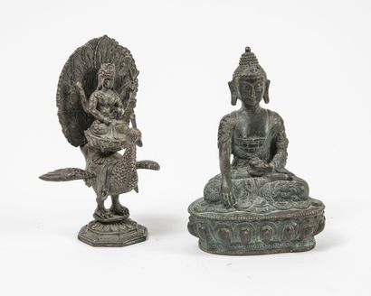 CHINE et THAILANDE, XXème siècle - Four-armed deity sitting in padamasana on a peacock....