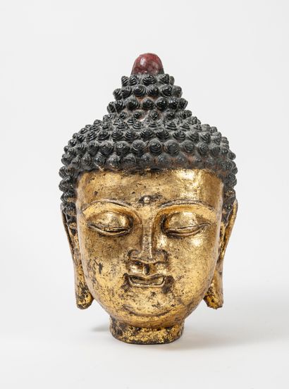 CHINE ou BIRMANIE, début du XXème siècle Tête de Bouddha

Epreuve en bronze à patine...