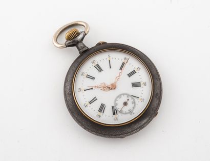  Pocket watch in patinated steel. 
White enamelled dial, indexes Roman numerals for...