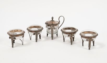 null Four saltcellars and a mustard pot with silver (950) frames with leaf friezes...