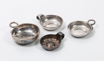 France, XVIIIème siècle Four silver wine tasters (950) plain or with friezes of half-spheres...