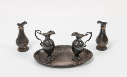 null A pair of silver (950) ovoid cruets on pedestals, without handles, decorated...