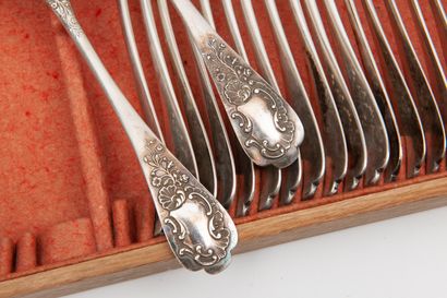 H. LAPEYRE Twelve silver cutlery (950), model with rocaille cartouche with trilobed...